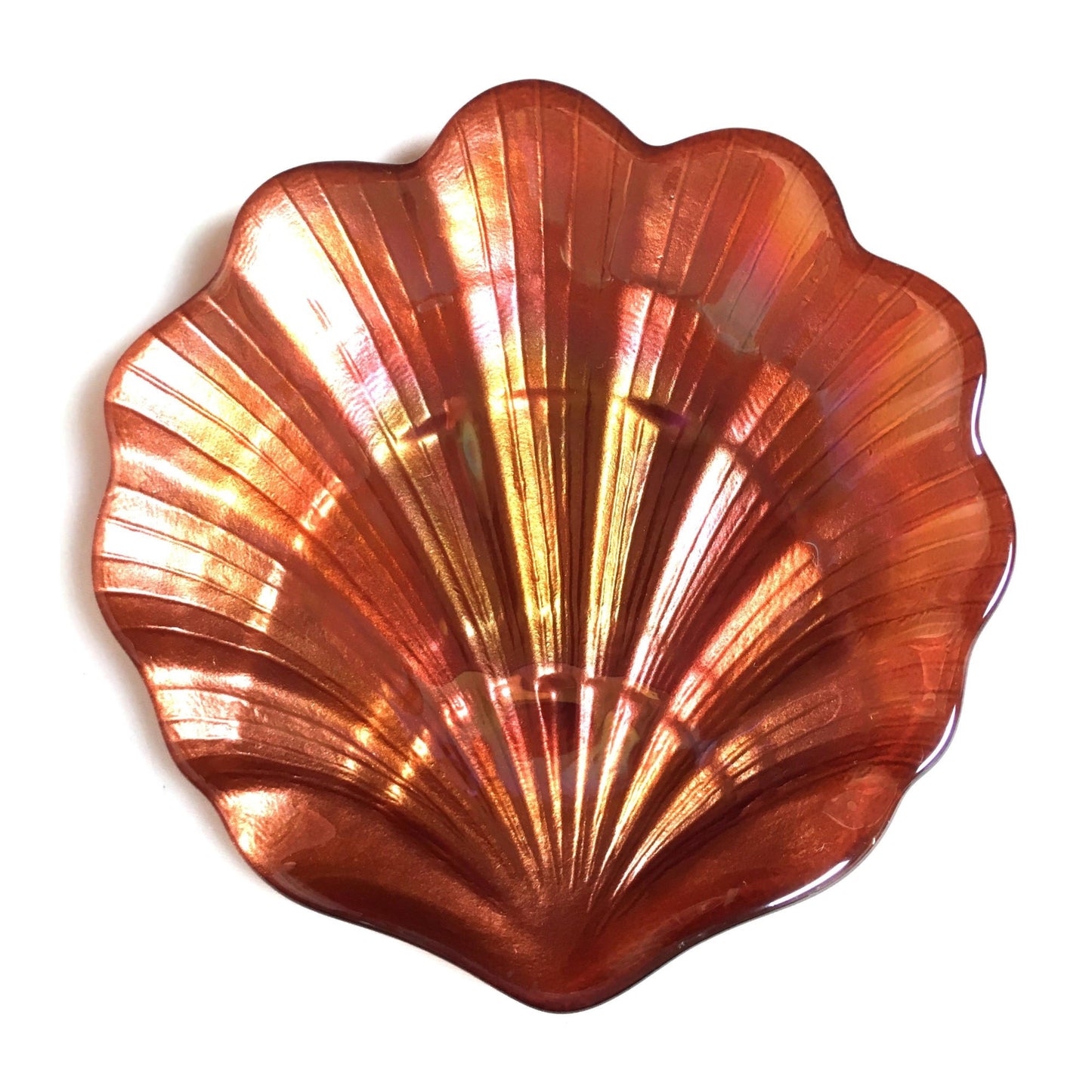 A copper-colored scallop shell-shaped glass plate with a metallic finish.