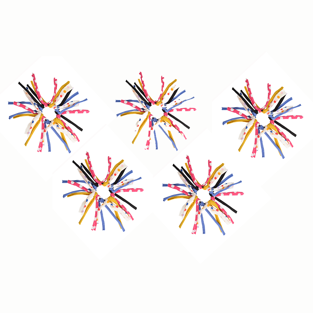 Colorful spiky hair accessories arranged symmetrically on a white background