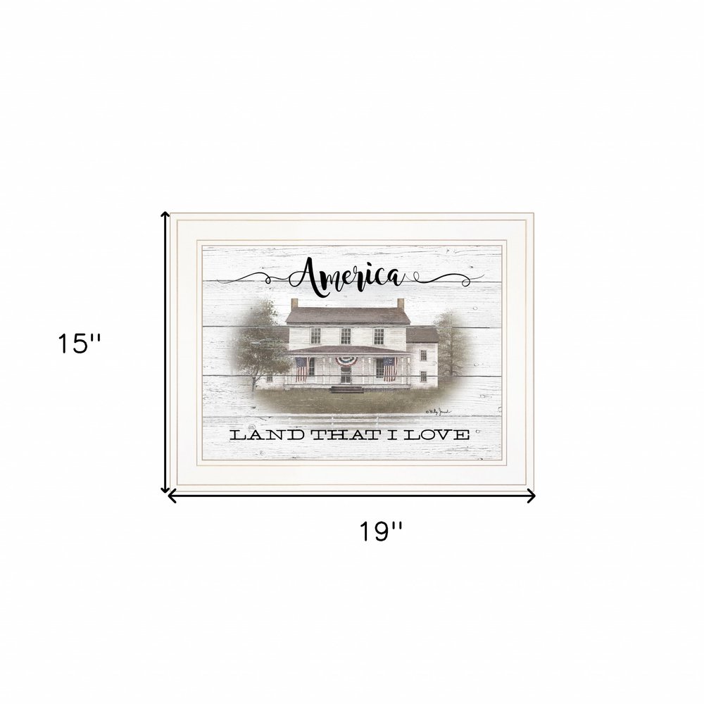 Framed artwork with a house illustration and text 'America Land That I Love' on a white background.