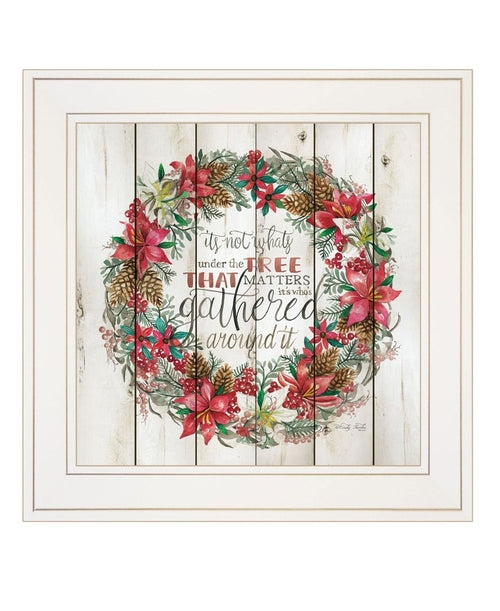 Decorative wall art with floral wreath and text on a wooden planks background