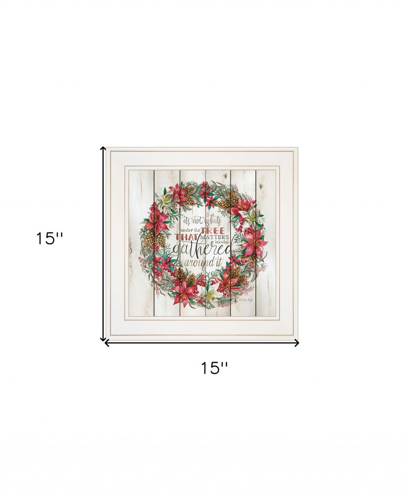 Framed artwork with floral wreath design and text on a white background