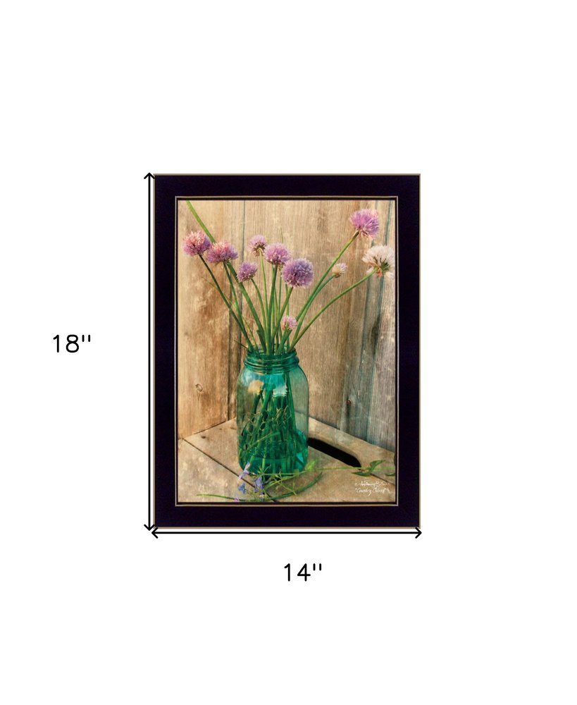 Framed artwork of a teal glass jar with flowers on a wooden background, with dimensions indicated.