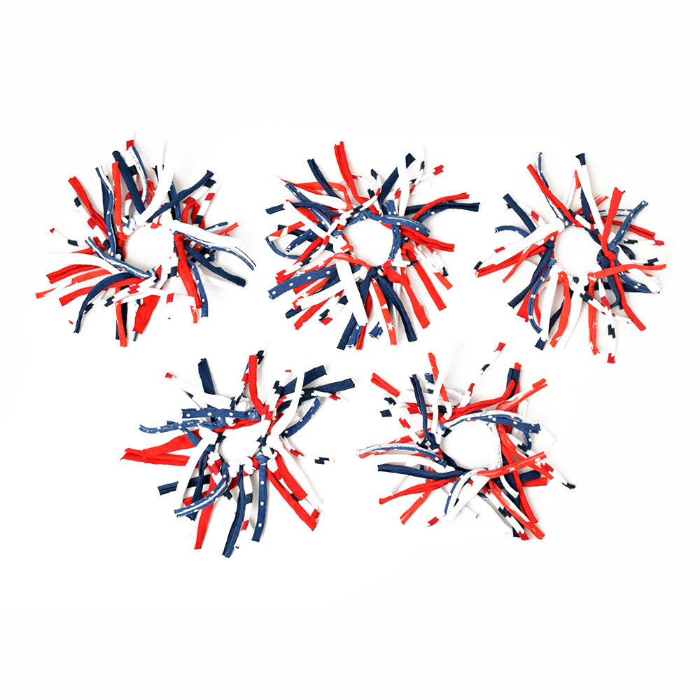 Red, white, and blue decorative items on a white background