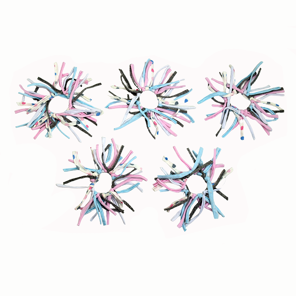 Five colorful hair scrunchies on a white background