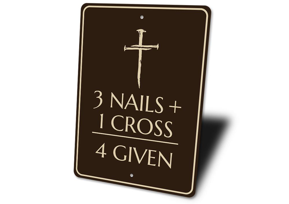 Decorative sign with a cross and text on a white background