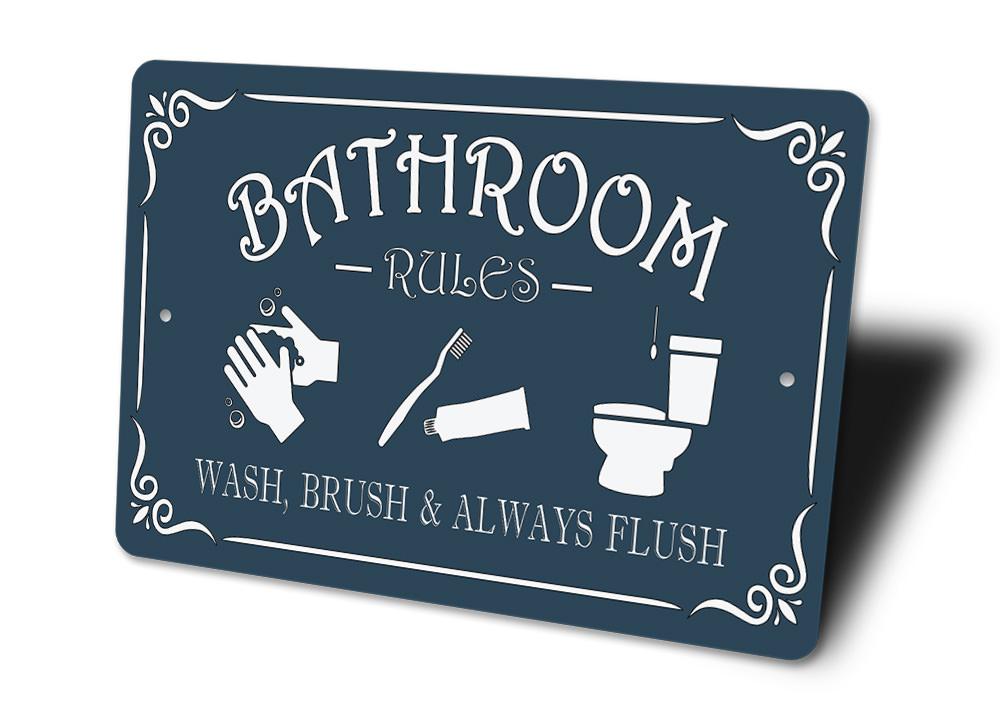 Navy blue sign with white text and icons for bathroom rules on a white background