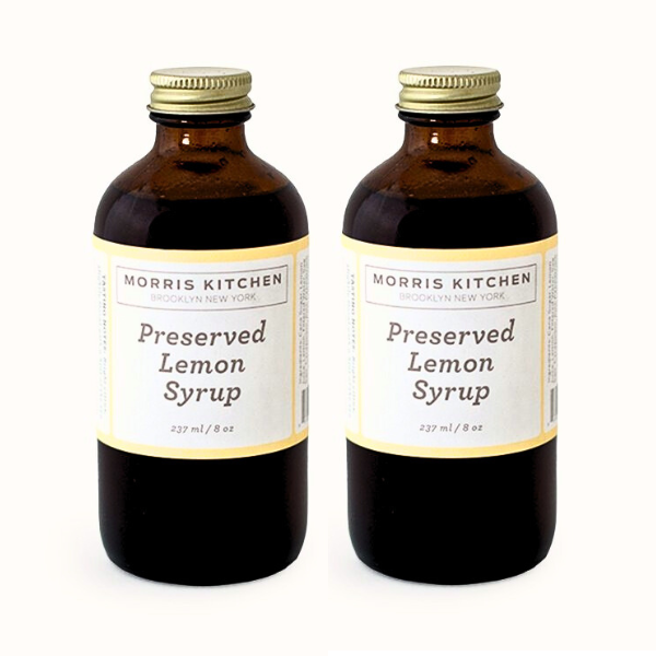 Two bottles of Morris Kitchen Preserved Lemon Syrup, each labeled 8oz.
