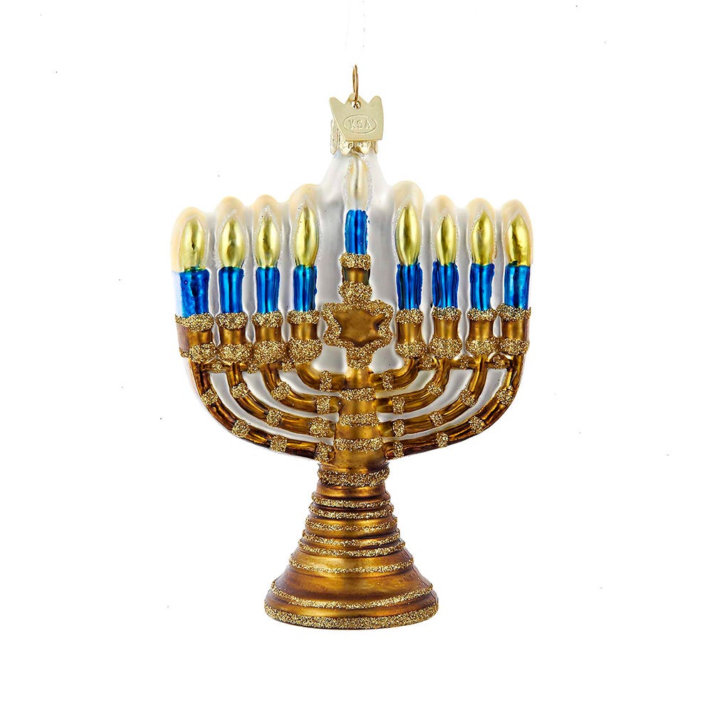 Decorative Menorah with blue and gold candles on a white background