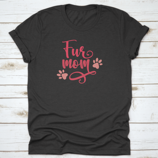 Black t-shirt with 'Fur Mom' text and paw prints on a wooden surface
