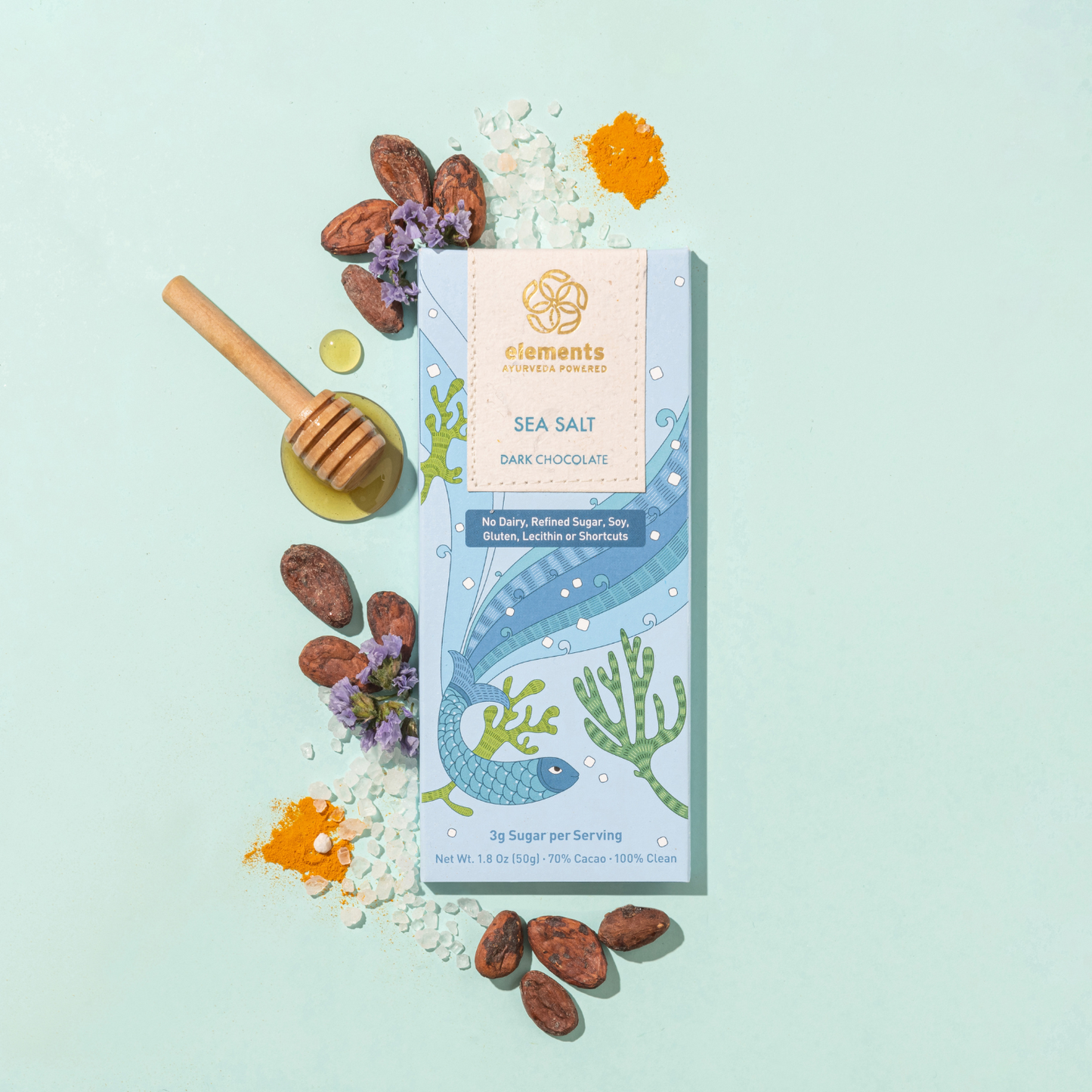 Sea Salt Dark Chocolate packaging with natural elements on a light blue background