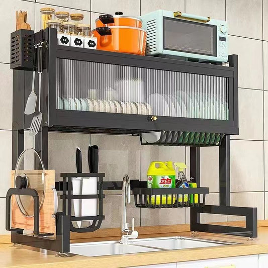 A black metal kitchen sink storage stand with multiple compartments, including a surface for drying dishes and storing kitchen utensils and appliances.
