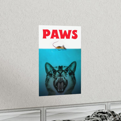 Poster with a tiger's face and 'PAWS' text on a white wall.