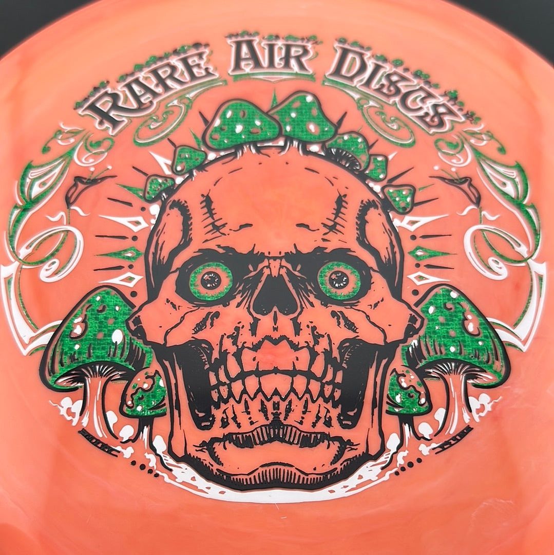 Aura Coalesce - Crushin' Amanitas stamp by Manny Trujillo