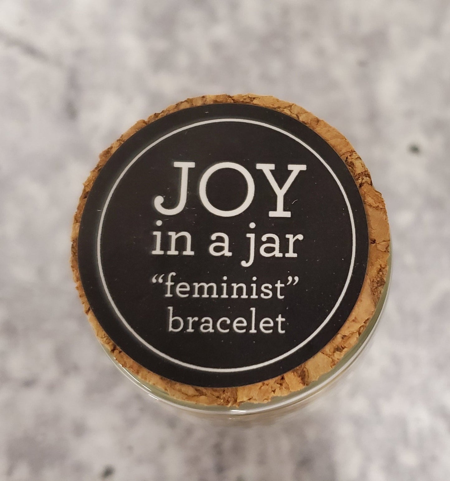 Feminist Stamped Brass Bar Woven Thread Bracelet | In a Giftable Glass