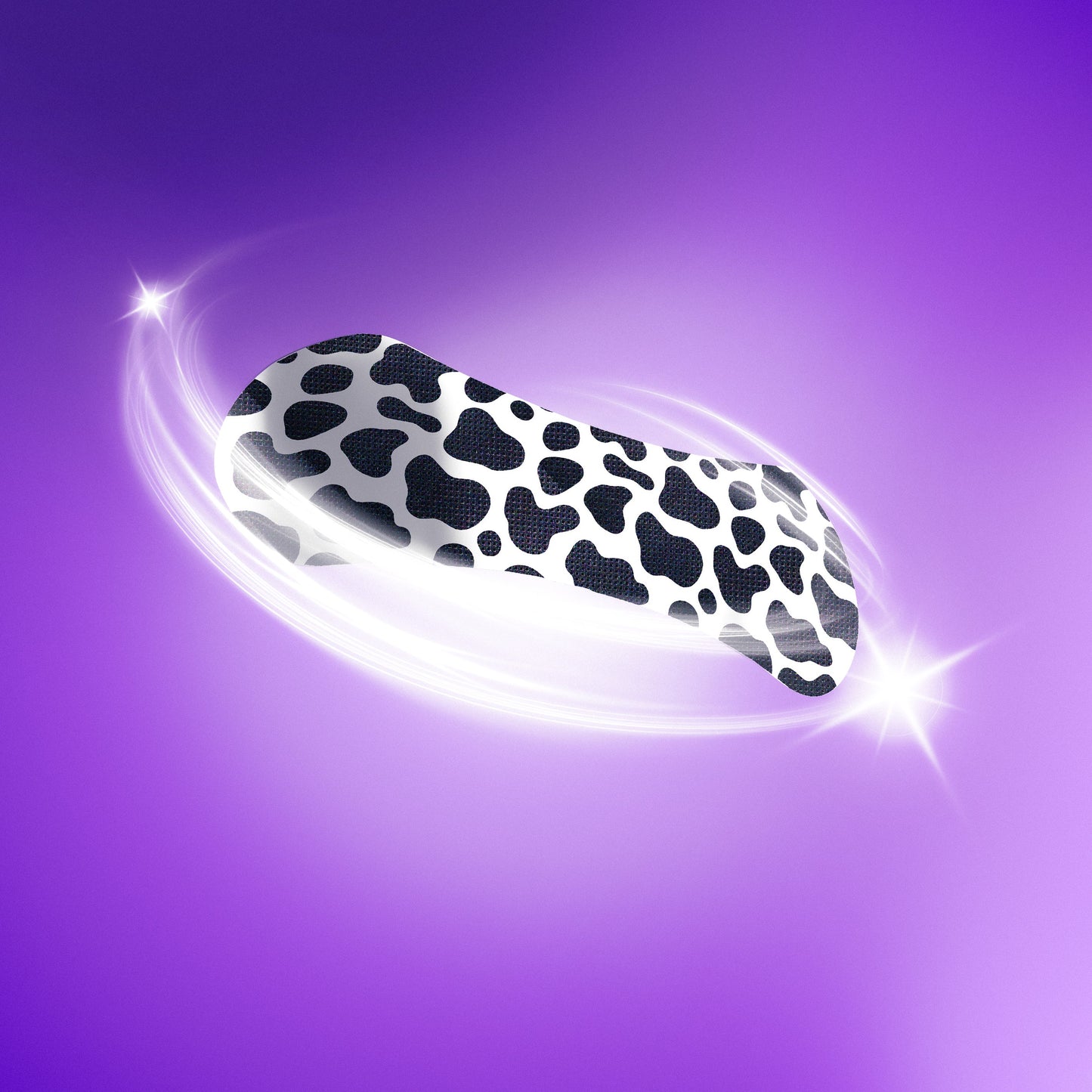 Cow print insole on a purple background