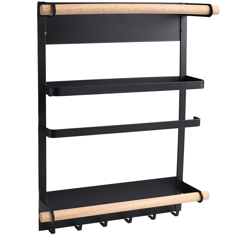 Black wall-mounted shelf with wooden rods on a white background