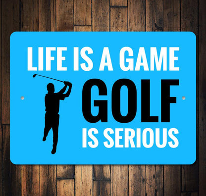 Blue sign with golf-themed text and silhouette on a wooden background