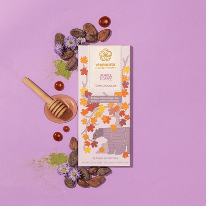 Maple Toffee chocolate bar with decorative elements on a purple background