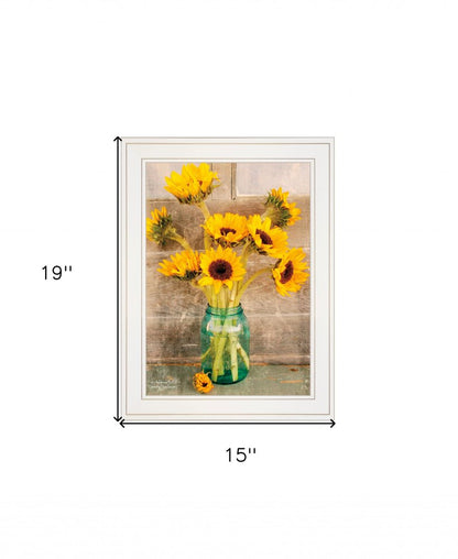 Framed artwork of sunflowers in a vase on a wooden background with dimensions indicated.