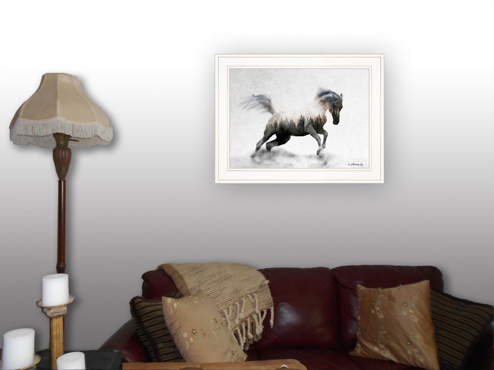 Framed artwork of a horse on a wall above a sofa with decorative pillows.