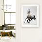 Framed artwork of a horse in a modern living room
