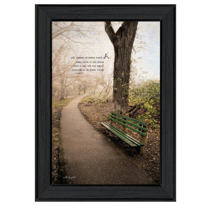 Framed print of a park scene with a bench and tree, featuring text.