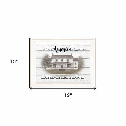Framed artwork with a house illustration and text 'America Land That I Love' on a white background.