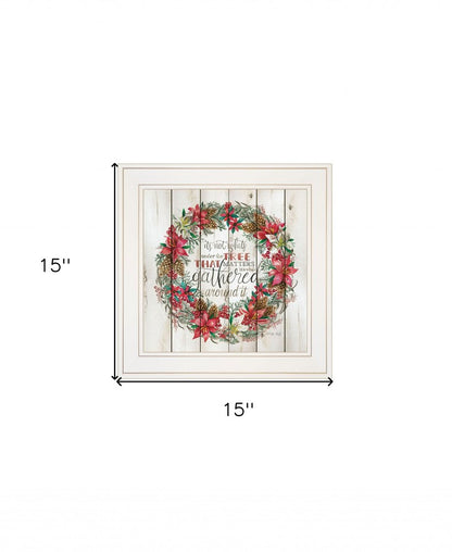 Framed artwork with floral wreath design and text on a white background