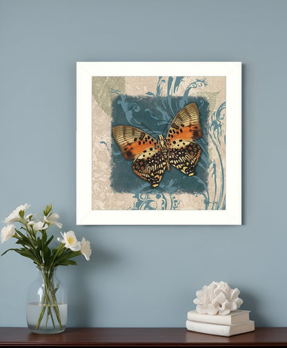 Framed butterfly artwork on a wall with a vase of flowers and decorative items below.
