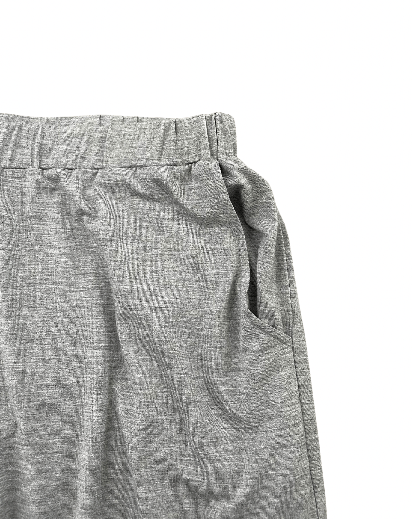 Close-up of gray athletic shorts on a white background