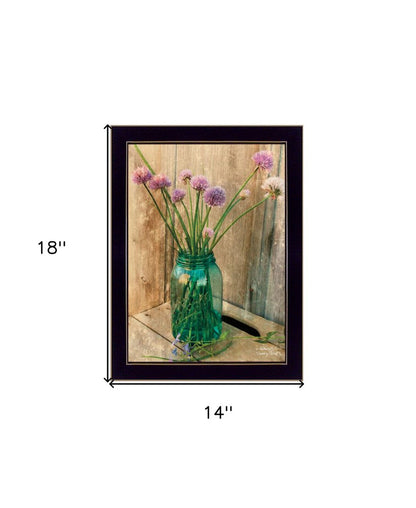Framed artwork of a teal glass jar with flowers on a wooden background, with dimensions indicated.