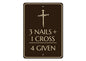 Decorative sign with cross and text on a brown background