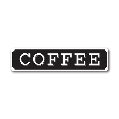 Black sign with 'COFFEE' text on a white background