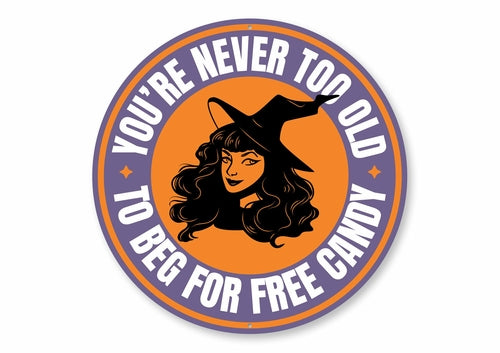 Circular sticker with a witch design and text 'You're never too old to beg for free candy' on an orange and purple background.