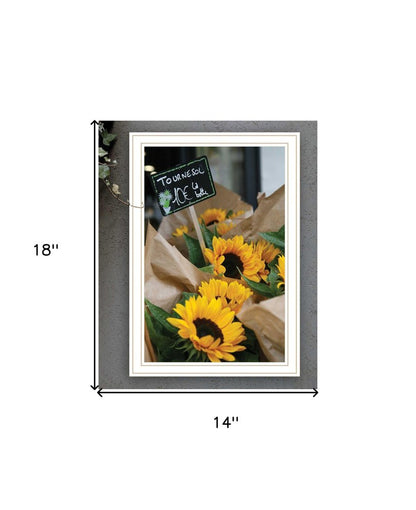 Framed picture of sunflowers with dimensions indicated
