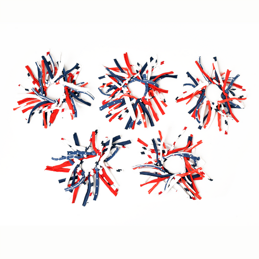 Red, white, and blue decorative items on a white background