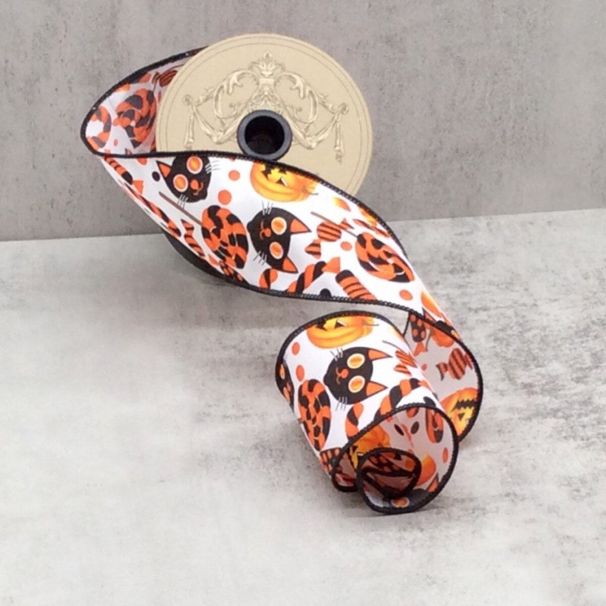 2.5" x 10yds linen halloween candy jack o lantern, orange black