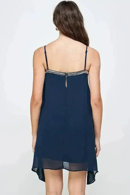 Flowy Sleeveless Mini Dress with Metallic Accents