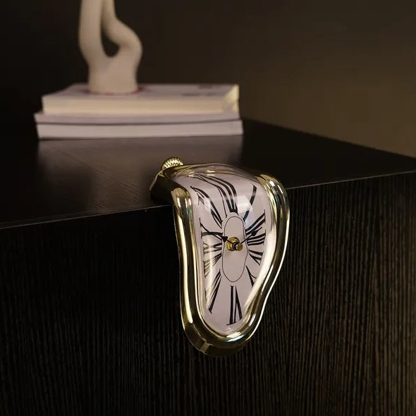 Surreal clock design on a dark surface with a blurred background