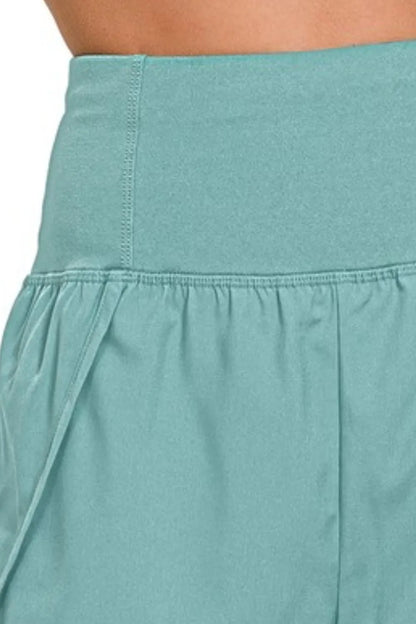Zenana High Waisted Zippered Back Pocket Running Shorts in Teal