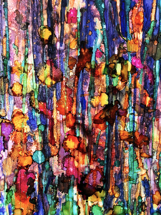 Multicolored abstract pattern with vertical streaks and dots