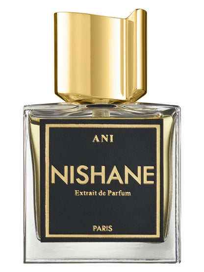 Nishane perfume bottle with gold cap and black label on a white background
