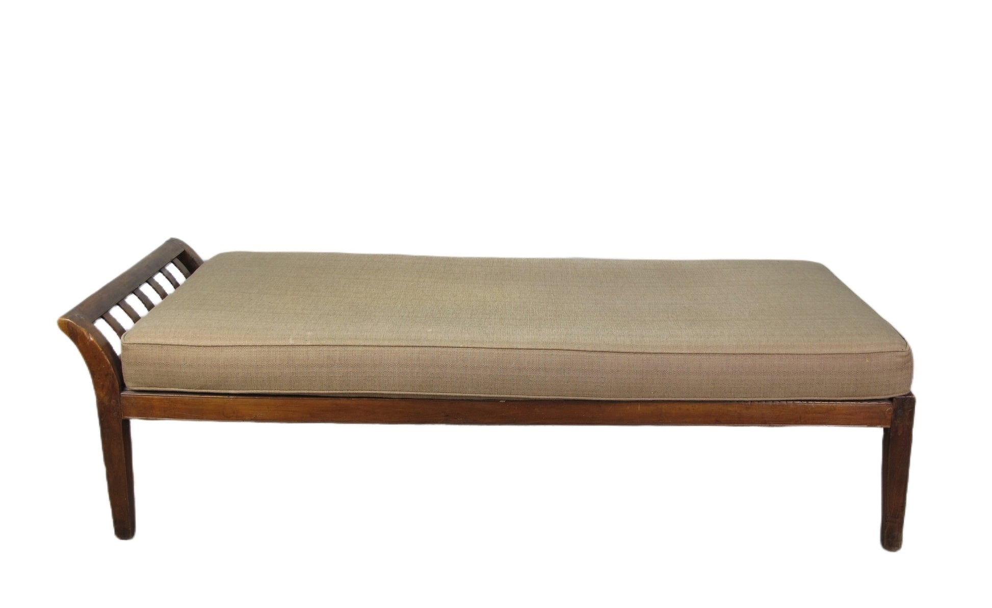 Beige cushioned bench with wooden frame on a white background
