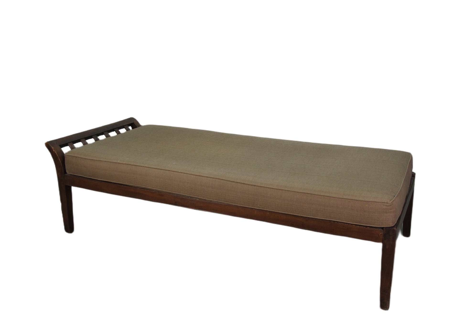 Wooden bench with a beige cushion on a white background
