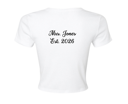 Customizable: Interlocking Rings and Coquette Bow Bride Micro Ribbed Baby Tee