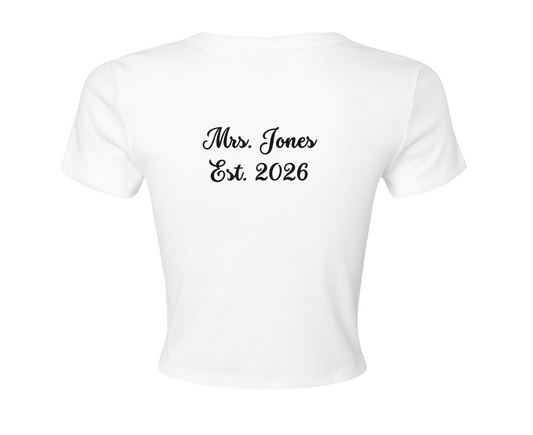 Customizable: Interlocking Rings and Coquette Bow Bride Micro Ribbed Baby Tee