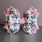 Skunk Deluxe Tumbler Bow