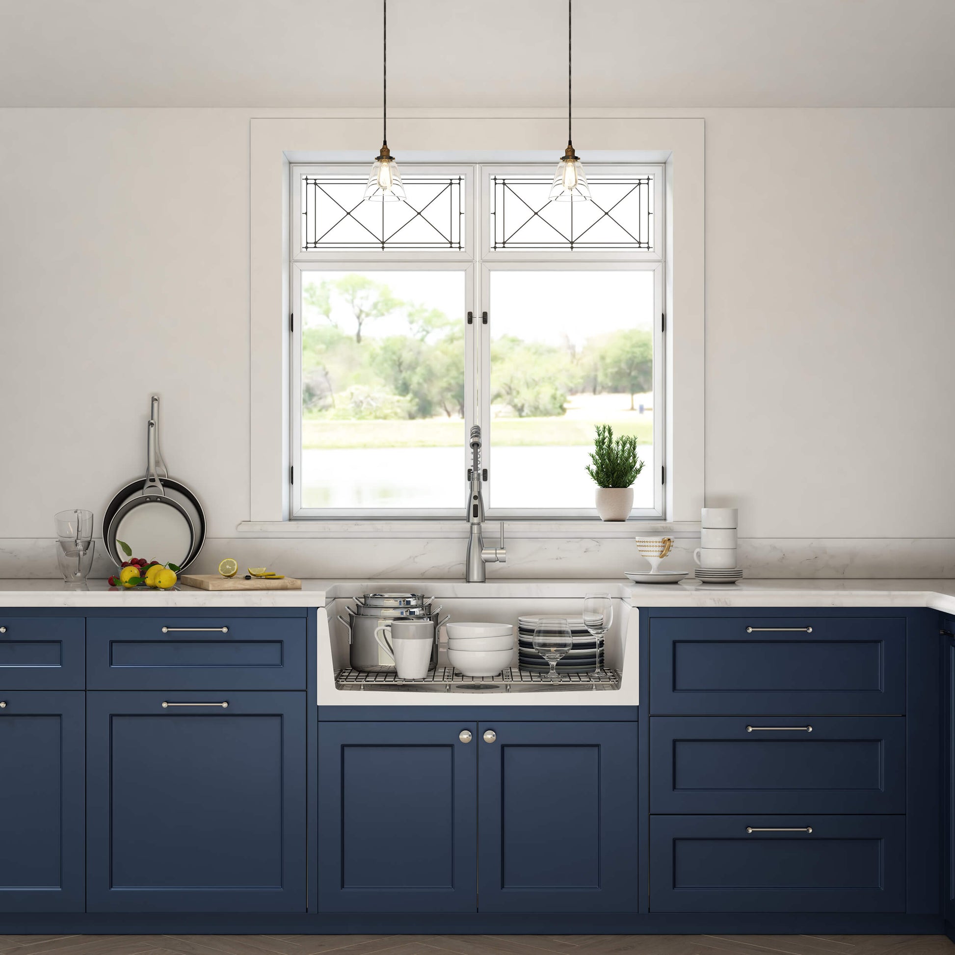 Modern kitchen with blue cabinets, white countertops, and a window.