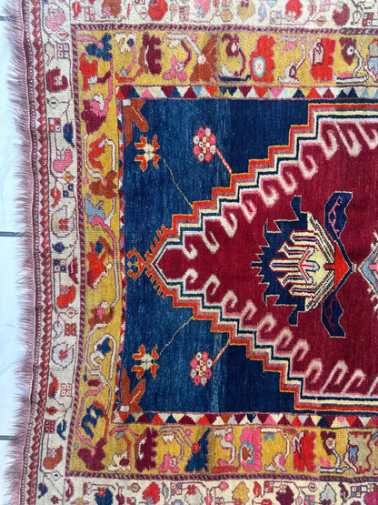 Hand-Knotted Antique Turkish Melas Wool Rug – 4'3" x 5'11" – Vibrant Geometric Motifs