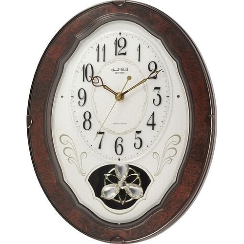 Decorative wall clock with wooden frame and floral design on a white background